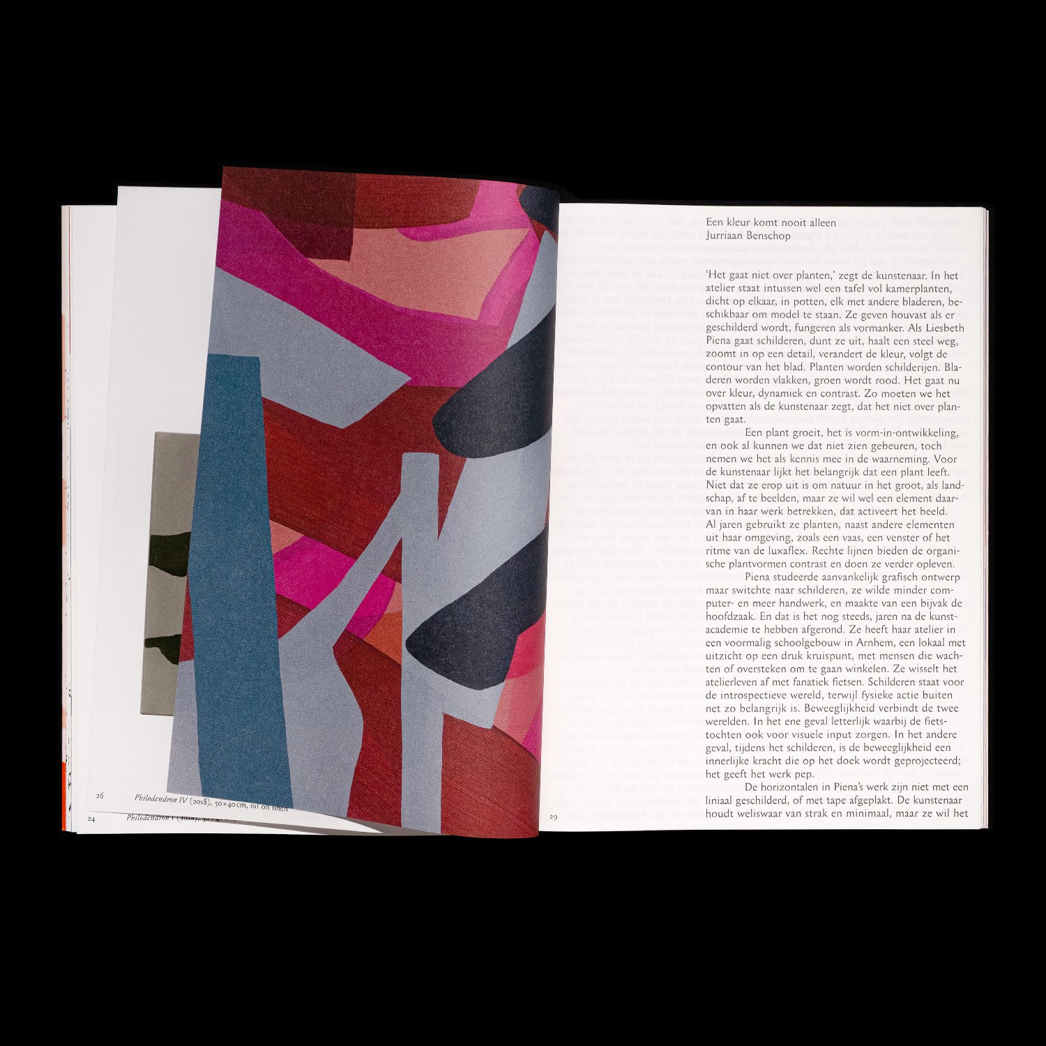 spread with a detail of a painting and text